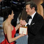 Sandra Bullock hands over the Oscar for Best Actor to Colin Firth